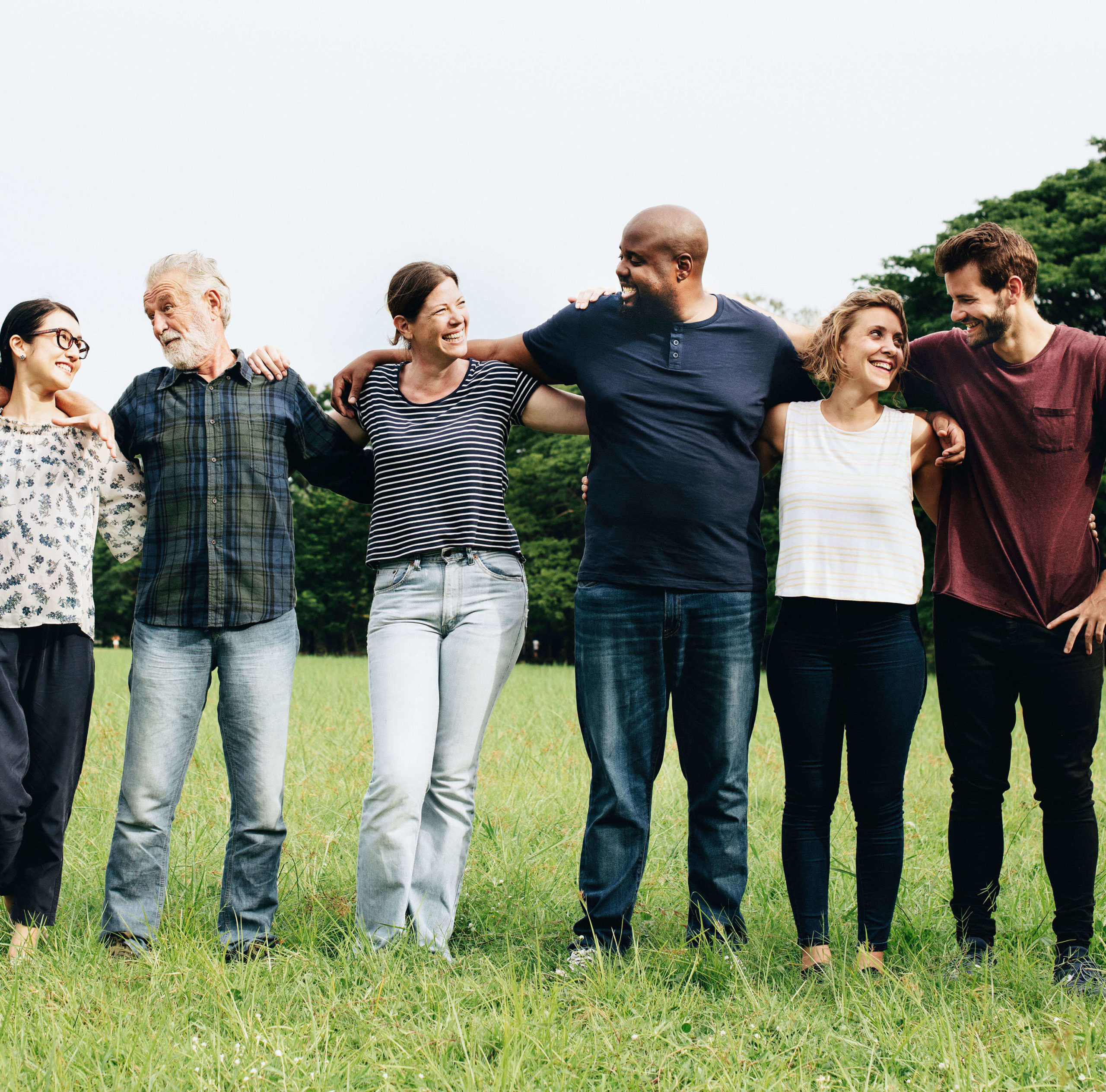 Group of people standing in a row